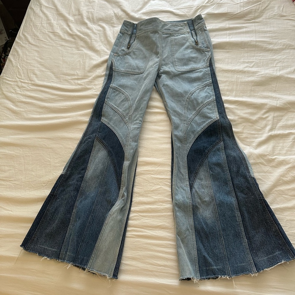 Free people zip up bell bottoms/ flared jeans.